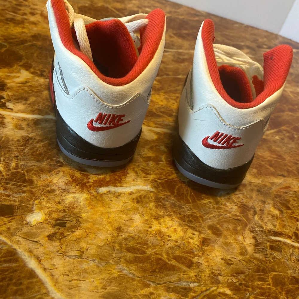 8c red and white Jordan’s 5
